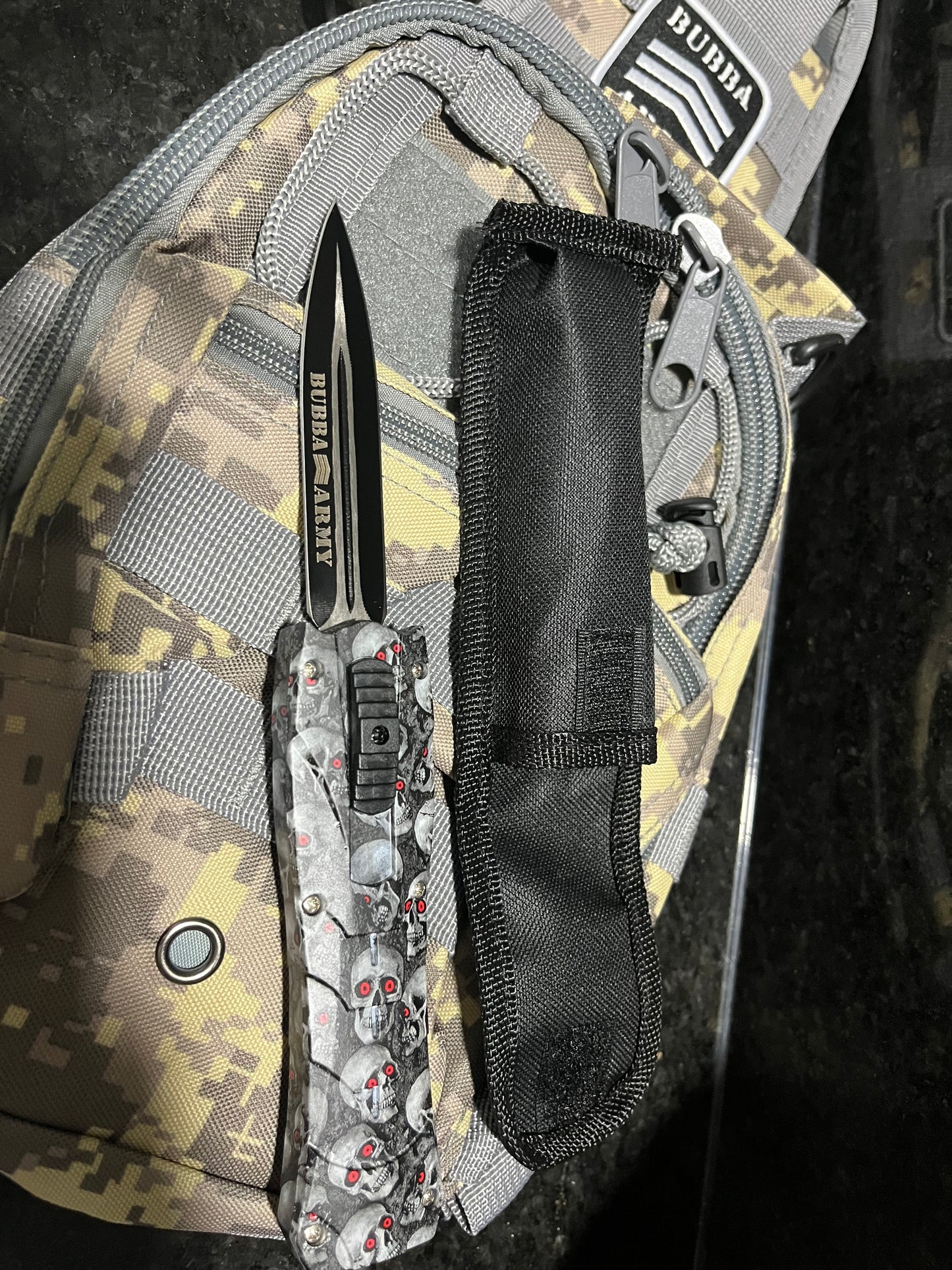 Retractable 9” hunting knife- Custom Bubba Army Logo on blade black skulls on handle, sleeve case included